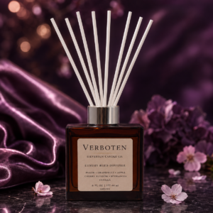 Verbothen Luxury Reed Diffuser with white reeds, surrounded by purple satin, hydrangeas, and delicate cherry blossoms.